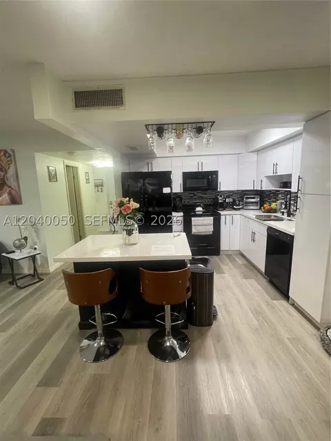 Kitchen - 6945 W 2nd Way, Hialeah, FL 33014 photo 1 of 2