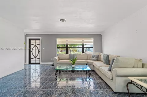 Living - 7701 W 16th Ct, Hialeah, FL 33014 photo 2 of 3
