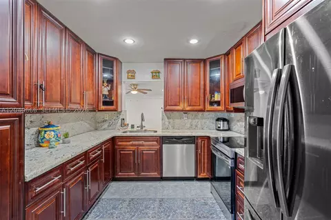 Kitchen - 7701 W 16th Ct, Hialeah, FL 33014 photo 1 of 2