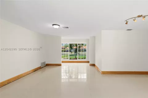 Living - 8197 W 14th Ct, Hialeah, FL 33014 photo 2 of 9