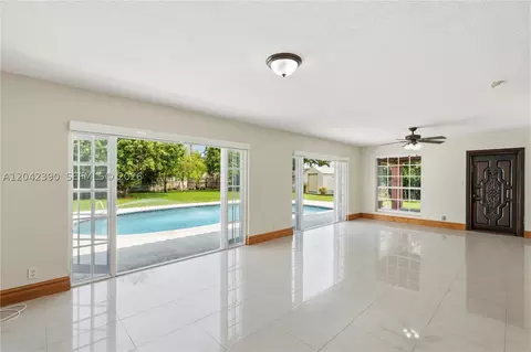 Living - 8197 W 14th Ct, Hialeah, FL 33014 photo 6 of 9