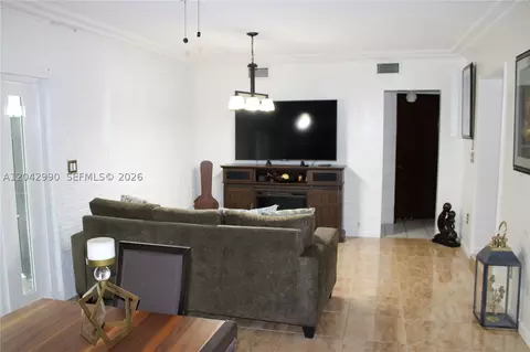 Living - 11512 NW 58th Ave, Hialeah, FL 33012 photo 1 of 1