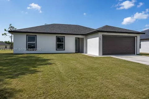 702 Carbon St, Lehigh Acres, FL 33974