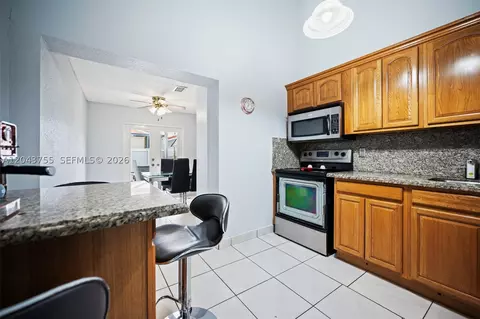 Kitchen - 7581 W 29th Way, Hialeah, FL 33018 photo 1 of 2