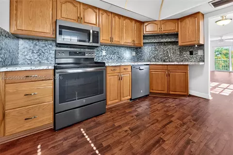 Kitchen - 9101 W Sample Rd #306, Coral Springs, FL 33065 photo 1 of 3