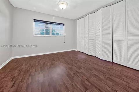 Bedroom - 9101 W Sample Rd #306, Coral Springs, FL 33065 photo 2 of 2