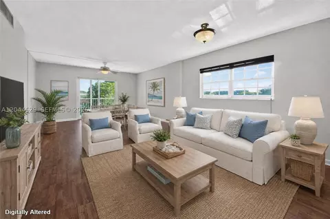 Living - 9101 W Sample Rd #306, Coral Springs, FL 33065 photo 1 of 4