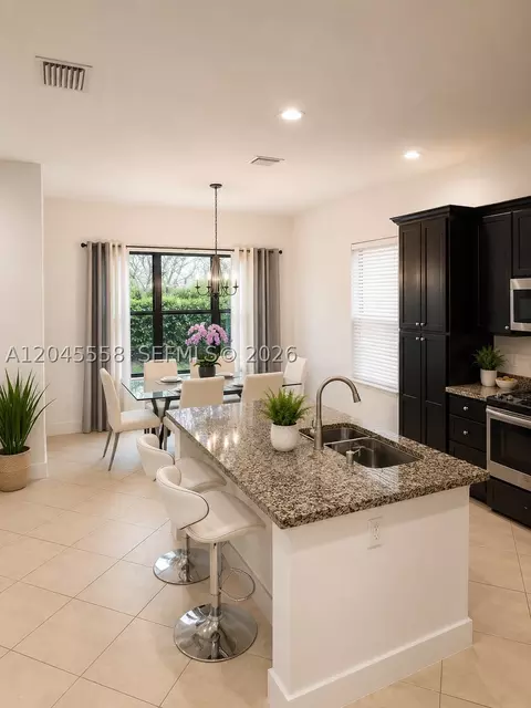 Kitchen - 3209 W 98th Pl, Hialeah, FL 33018 photo 2 of 2