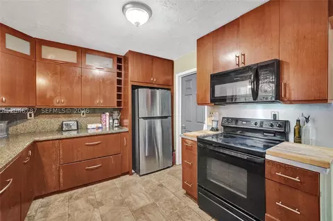 Kitchen - 206 SE 3rd St, Dania Beach, FL 33004 photo 2 of 3