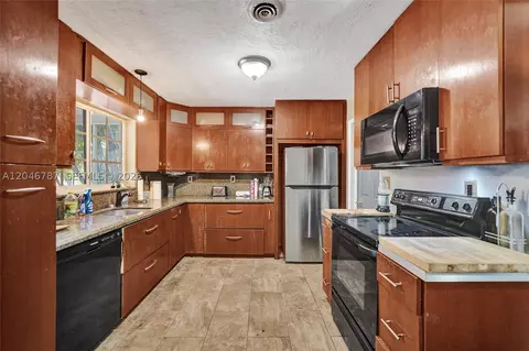 Kitchen - 206 SE 3rd St, Dania Beach, FL 33004 photo 1 of 3