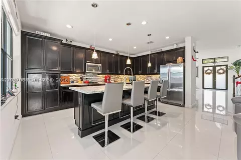 Kitchen - 14856 SW 27th Ter, Miami, FL 33185 photo 1 of 4