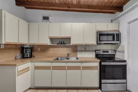 Kitchen - 6084 E 7th Ave, Hialeah, FL 33013 photo 2 of 2