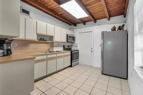 Kitchen - 6084 E 7th Ave, Hialeah, FL 33013 photo 1 of 2