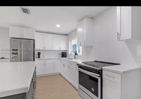 Kitchen - 329 W 18th St, Hialeah, FL 33010 photo 4 of 5