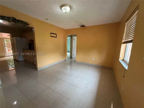 Living - 1061 E 20th St, Hialeah, FL 33013 photo 1 of 2