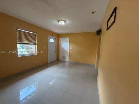 Living - 1061 E 20th St, Hialeah, FL 33013 photo 2 of 2
