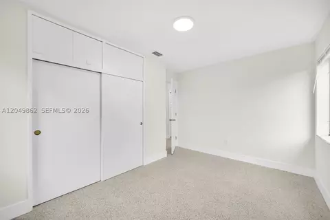 Bedroom - 1380 W 60th Ter, Hialeah, FL 33012 photo 6 of 12
