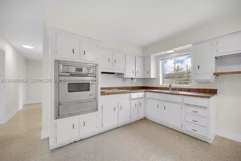 Kitchen - 1380 W 60th Ter, Hialeah, FL 33012 photo 3 of 3