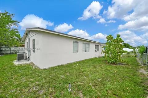 Exterior - 1380 W 60th Ter, Hialeah, FL 33012 photo 6 of 7