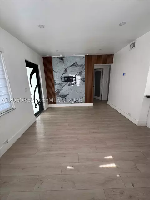 Living - 690 E 46th St, Hialeah, FL 33013 photo 1 of 2