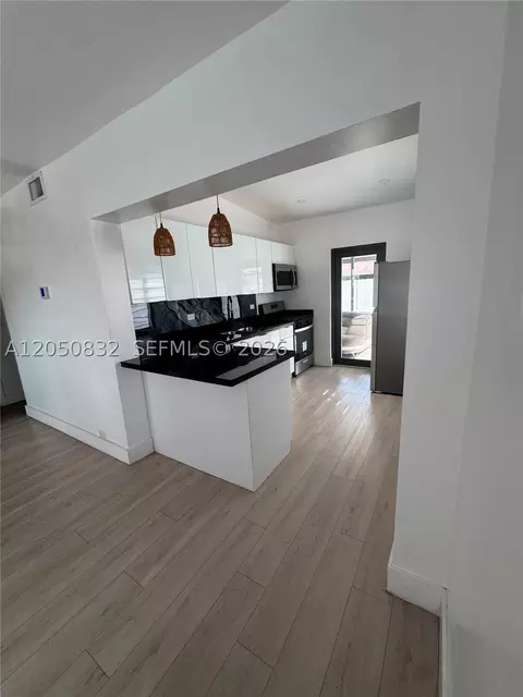 Kitchen - 690 E 46th St, Hialeah, FL 33013 photo 2 of 2