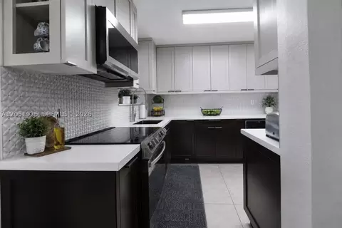 Kitchen - 5865 W 13 Ave, Hialeah, FL 33012 photo 2 of 2