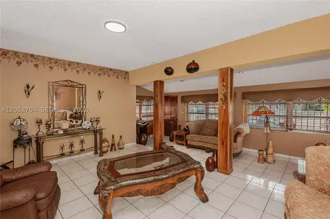Living - 225 E 43rd St, Hialeah, FL 33013 photo 2 of 3