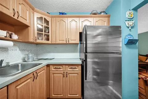 Kitchen - 1335 W 68th St #204, Hialeah, FL 33014 photo 2 of 4