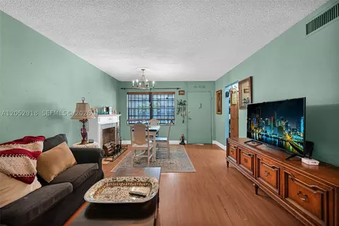 Living - 1335 W 68th St #204, Hialeah, FL 33014 photo 5 of 6