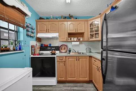 Kitchen - 1335 W 68th St #204, Hialeah, FL 33014 photo 1 of 4