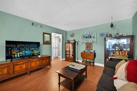 Living - 1335 W 68th St #204, Hialeah, FL 33014 photo 4 of 6