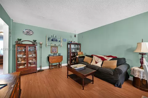 Living - 1335 W 68th St #204, Hialeah, FL 33014 photo 3 of 6