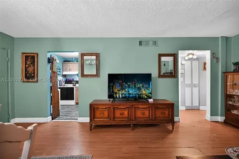 Living - 1335 W 68th St #204, Hialeah, FL 33014 photo 2 of 6
