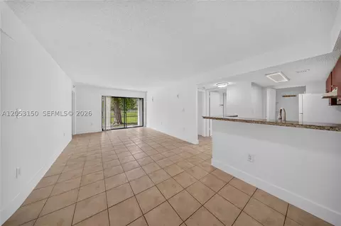 Living - 7195 NW 179th St #109, Hialeah, FL 33015 photo 6 of 7