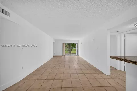 Living - 7195 NW 179th St #109, Hialeah, FL 33015 photo 5 of 7