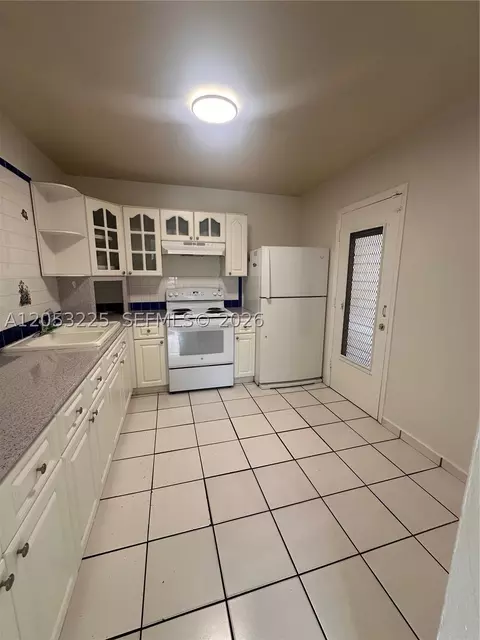 Kitchen - 5325 SW 77th Ct #107F, Miami, FL 33155 photo 1 of 2