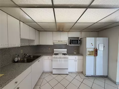 Kitchen - 881 E 14th St, Hialeah, FL 33010 photo 1 of 3