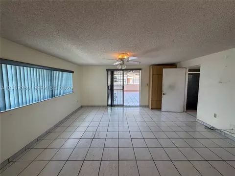Living - 881 E 14th St, Hialeah, FL 33010 photo 5 of 6