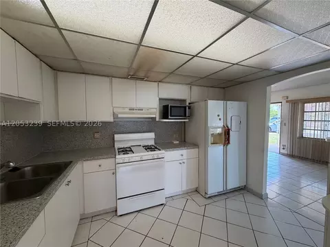 Kitchen - 881 E 14th St, Hialeah, FL 33010 photo 2 of 3