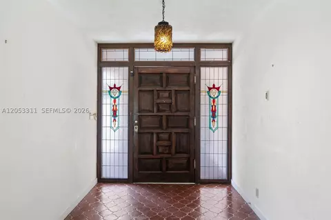 Entry Way - 11950 SW 67 Ct, Pinecrest, FL 33156 photo 1 of 2