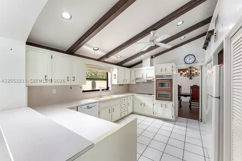 Kitchen - 11950 SW 67 Ct, Pinecrest, FL 33156 photo 2 of 2