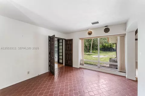 Living - 11950 SW 67 Ct, Pinecrest, FL 33156 photo 6 of 8
