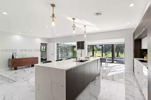 Kitchen - 19035 E St Andrews Dr, Hialeah, FL 33015 photo 3 of 4