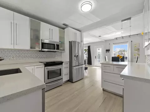 Kitchen - 355 W 62nd St, Hialeah, FL 33012 photo 3 of 5