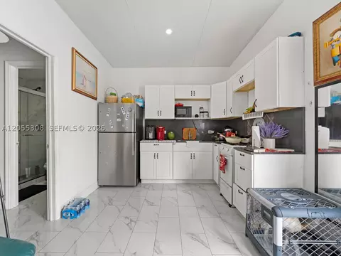 Kitchen - 355 W 62nd St, Hialeah, FL 33012 photo 5 of 5