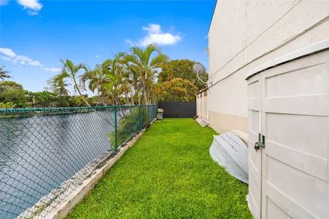 Exterior - 7282 Jacaranda Ln, Miami Lakes, FL 33014 photo 9 of 13