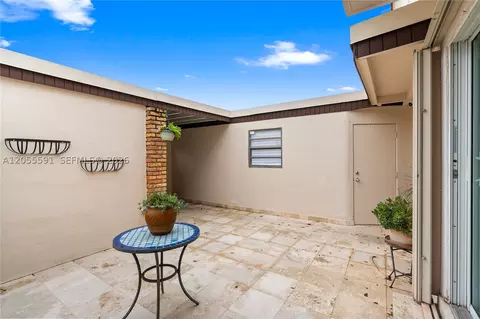 Exterior - 7282 Jacaranda Ln, Miami Lakes, FL 33014 photo 7 of 13