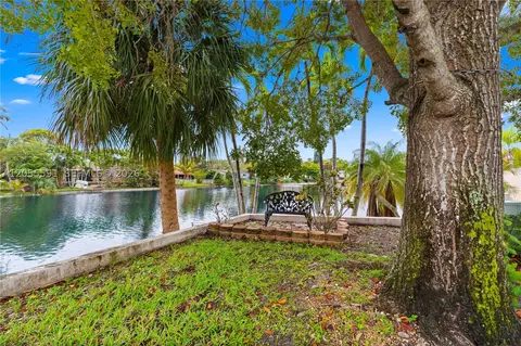 Exterior - 7282 Jacaranda Ln, Miami Lakes, FL 33014 photo 3 of 13