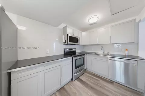 Kitchen - 76 W 14 St, Hialeah, FL 33010 photo 2 of 2