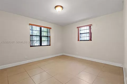 Bedroom - 3220 E 8th Ave, Hialeah, FL 33013 photo 4 of 5